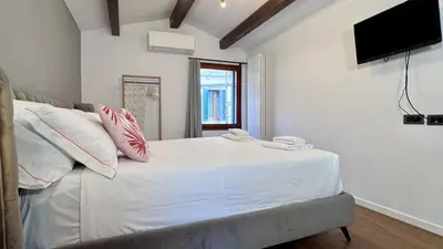 Letto o letti in una camera di Ca' ai Sospiri