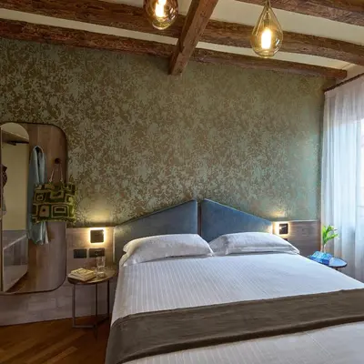 Letto o letti in una camera di Residenza Favaro