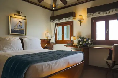 Letto o letti in una camera di Hotel Bucintoro