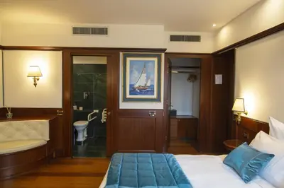 Letto o letti in una camera di Hotel Bucintoro