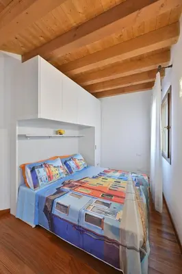 Letto o letti in una camera di Pink Paradise