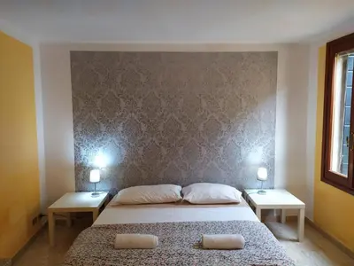 Letto o letti in una camera di Two steps from Rialto bridge