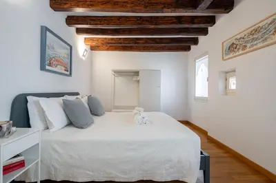 Letto o letti in una camera di Ca' Laura - San Marco Canal View
