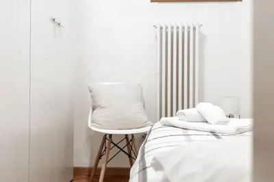 Letto o letti in una camera di Ca' Latina - Cozy home in pieno centro storico