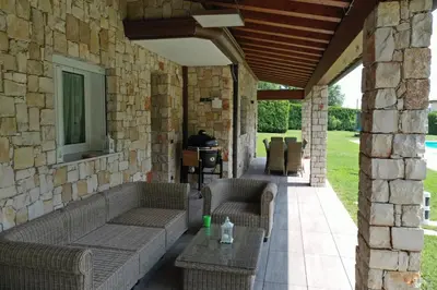 Area soggiorno di Wanderlust Apt in Villa con Piscina - 45 min Venezia - Zona Unesco