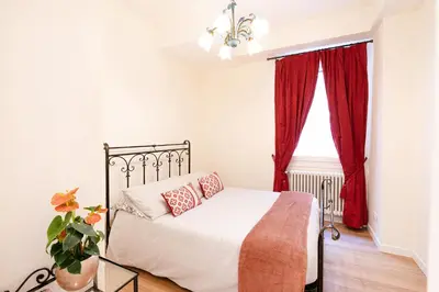 Letto o letti in una camera di Ricco di comfort, grande, luminoso e comodo
