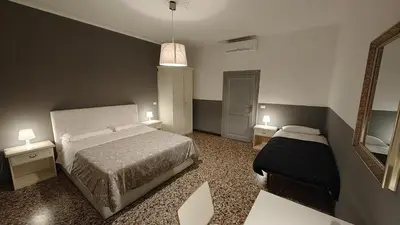 Letto o letti in una camera di Corte Loredana