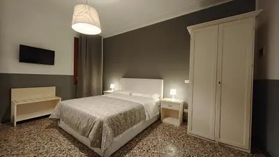 Letto o letti in una camera di Corte Loredana