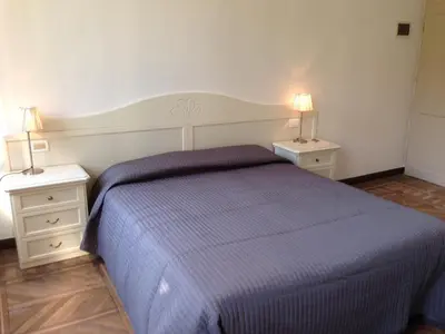Letto o letti in una camera di Corte Loredana