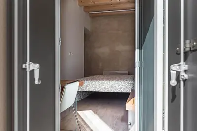 Letto o letti in una camera di Palazzo '900 Design Flats - Il Fondatore
