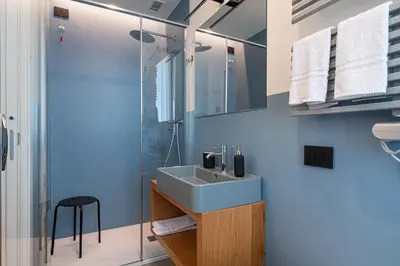 Bagno di [Attico di Design] a 5 min da Centro e Fiera