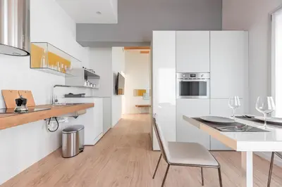 Cucina o angolo cottura di Palazzo '900 Design Flats - L'Orologiaio