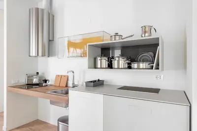 Cucina o angolo cottura di Palazzo '900 Design Flats - L'Orologiaio