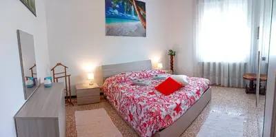 Letto o letti in una camera di Ampio APPARTAMENTO VICINO AL CENTRO DI TREVISO, PARCHEGGIO GRATUITO
