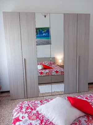 Letto o letti in una camera di Ampio APPARTAMENTO VICINO AL CENTRO DI TREVISO, PARCHEGGIO GRATUITO