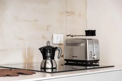Set per la preparazione di tè e caffè presso Palazzo '900 Design Flats - L'Orto