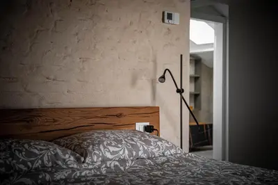 Letto o letti in una camera di Palazzo '900 Design Flats - Il Prato