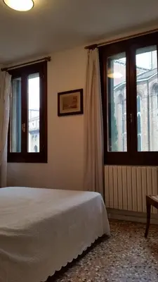 Letto o letti in una camera di Appartamento San Rocco