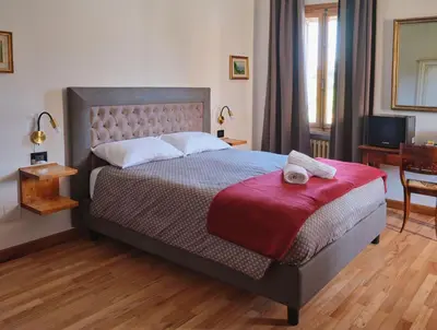 Letto o letti in una camera di VILLA MARGHERITA