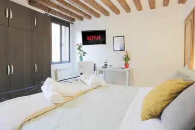Letto o letti in una camera di SANTA CROCE GUEST HOUSE