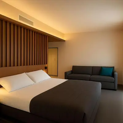 Letto o letti in una camera di Hotel Miramare