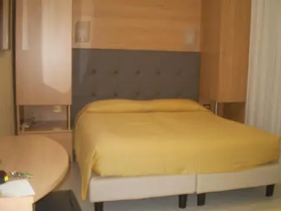 Letto o letti in una camera di Hotel Baviera