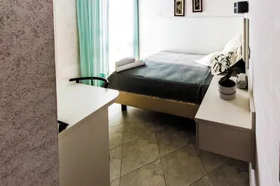 Letto o letti in una camera di Hotel Baviera