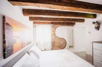 Letto o letti in una camera di La Vida by Venicevillas