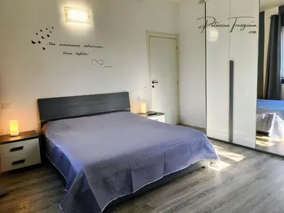 Letto o letti in una camera di Palazzina Trevigiana 2 king Size Near Station And Venice