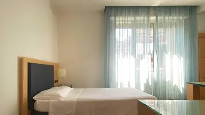 Letto o letti in una camera di Luxury Rooms Padova Station