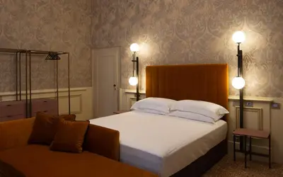 Letto o letti in una camera di Eight Venezia