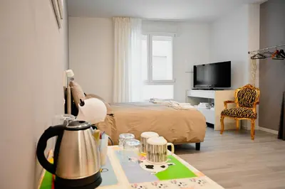 Letto o letti in una camera di Cozy Studio Downtown