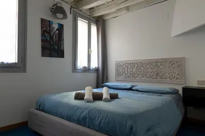 Letto o letti in una camera di Ca' Casinò