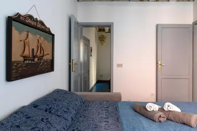 Letto o letti in una camera di Ca' Casinò