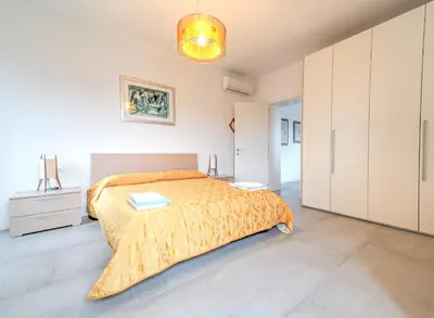Letto o letti in una camera di Cà Laguna Lido