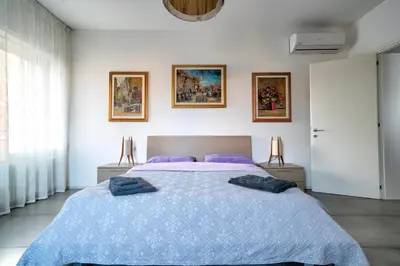 Letto o letti in una camera di Cà Laguna Lido