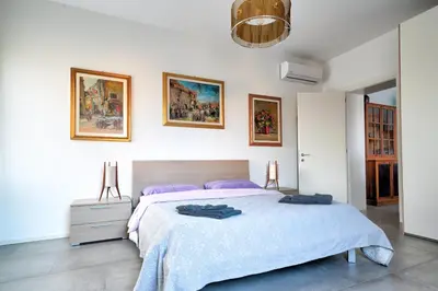 Letto o letti in una camera di Cà Laguna Lido