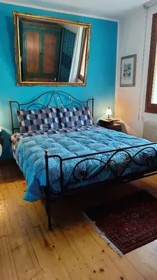 Letto o letti in una camera di Casa Monte Villa