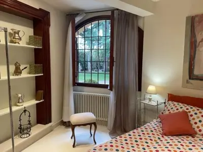 Letto o letti in una camera di il loggiato 1