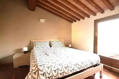 Letto o letti in una camera di Il Tamarindo - in pieno centro storico