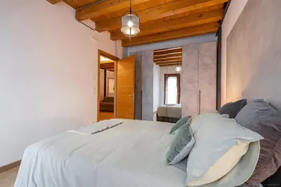Letto o letti in una camera di [Venezia-Suite Hemingway]a pochi passi Outlet