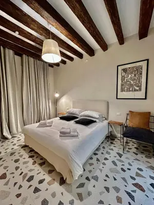 Letto o letti in una camera di Farini Suites wi-fi