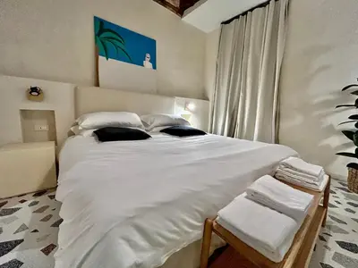Letto o letti in una camera di Farini Suites wi-fi