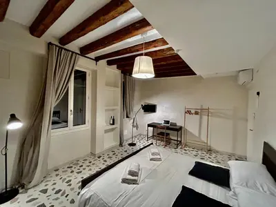 Letto o letti in una camera di Farini Suites wi-fi