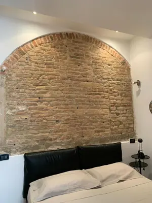 Letto o letti in una camera di Casa Manuela non turisti ma ospiti