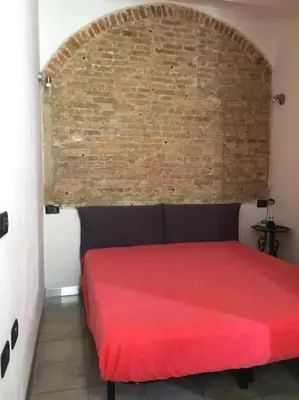 Letto o letti in una camera di Casa Manuela non turisti ma ospiti