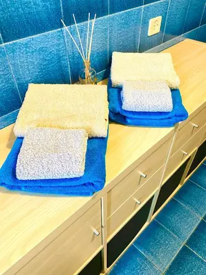 Letto o letti in una camera di HOME - Alessandra Holiday House