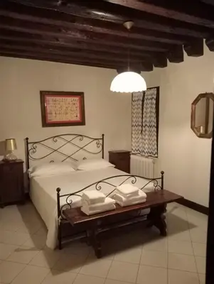 Letto o letti in una camera di Appartamento Chioggia
