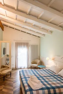 Letto o letti in una camera di La Meridiana B&B