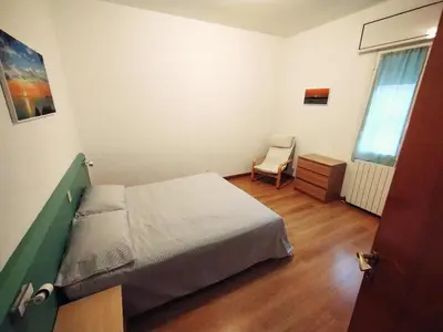 Letto o letti in una camera di Villa Rosa